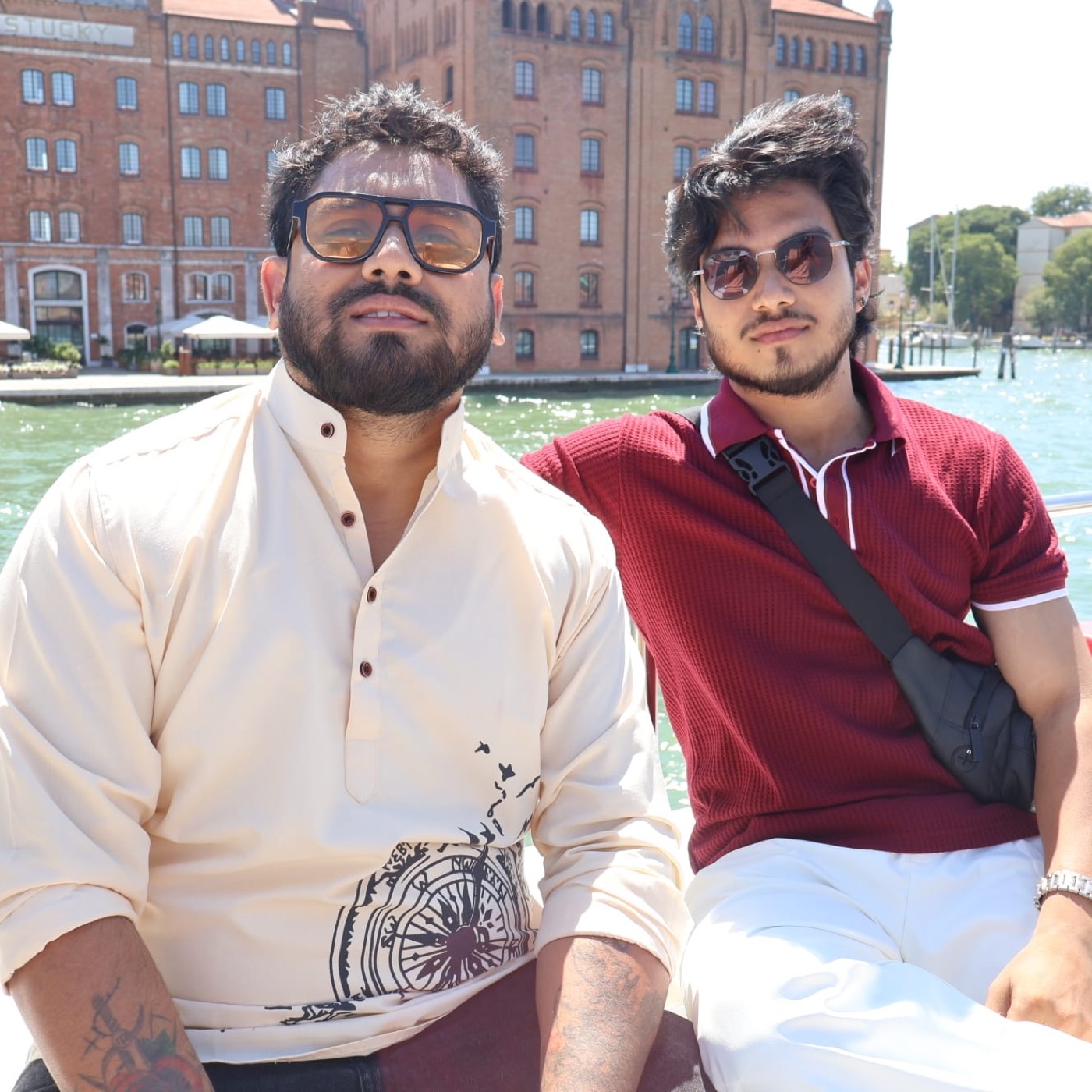 Two travellers on a boat on the Giudecca Canal, Venice