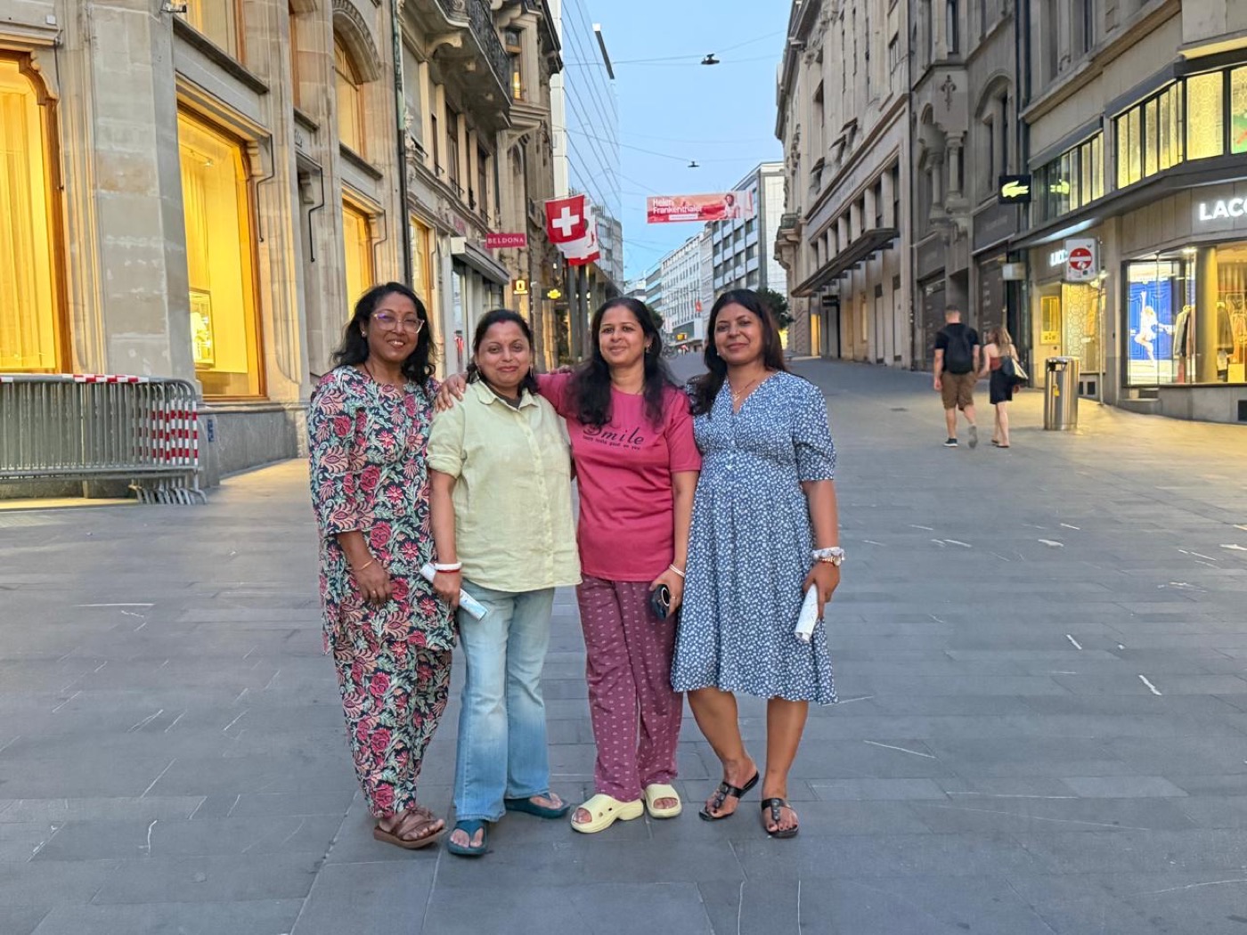 Four travellers on Bahnhofstrasse in the evening, Zurich